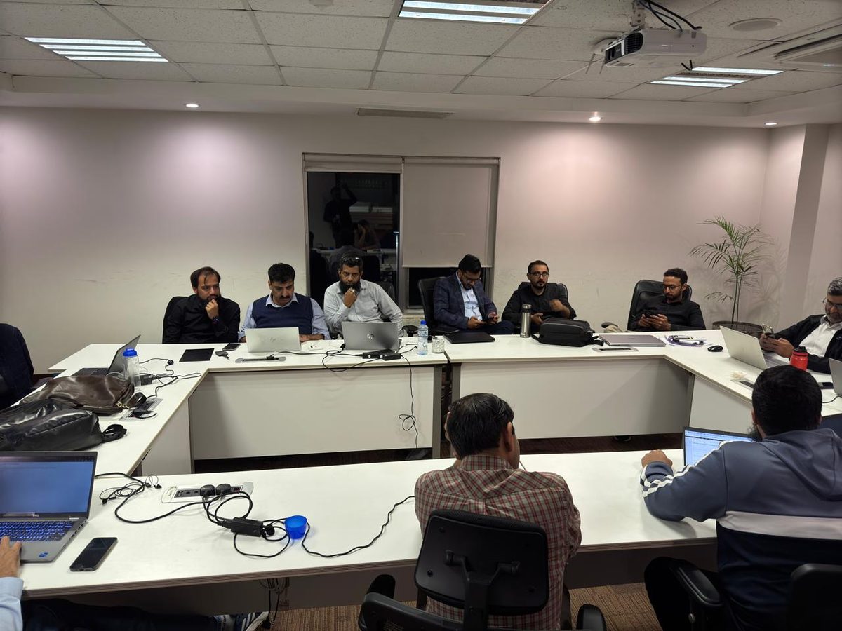Architecture workshop with engineering teams around a conference table